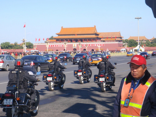 Crossing the street to Tiananmen Square.
